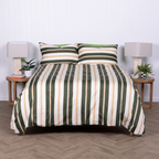Norfolk bedding set with olive, white, and amber stripes on a made bed.