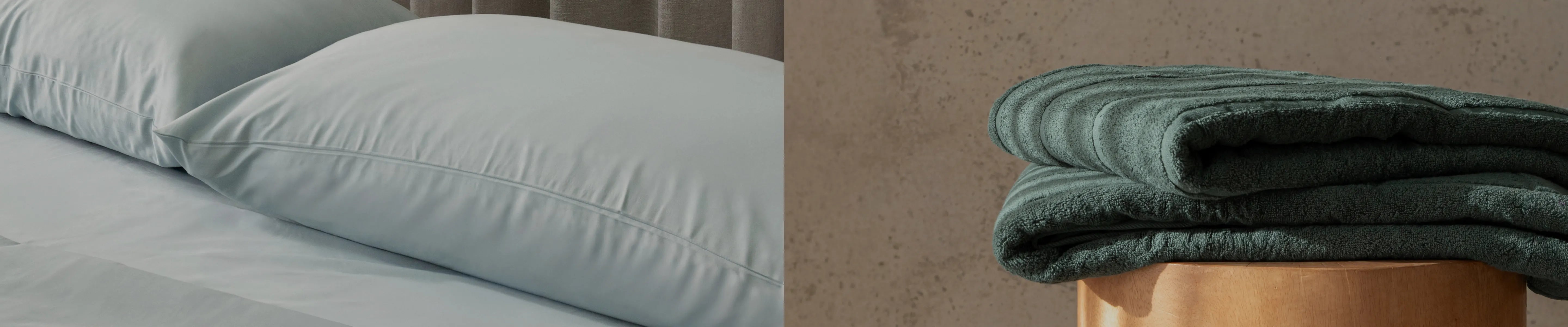Bedding set with green sheets and pillows on a bed, and a green towel on a wooden surface.
