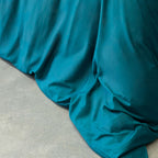 Close-up of blue fabric draped over a surface