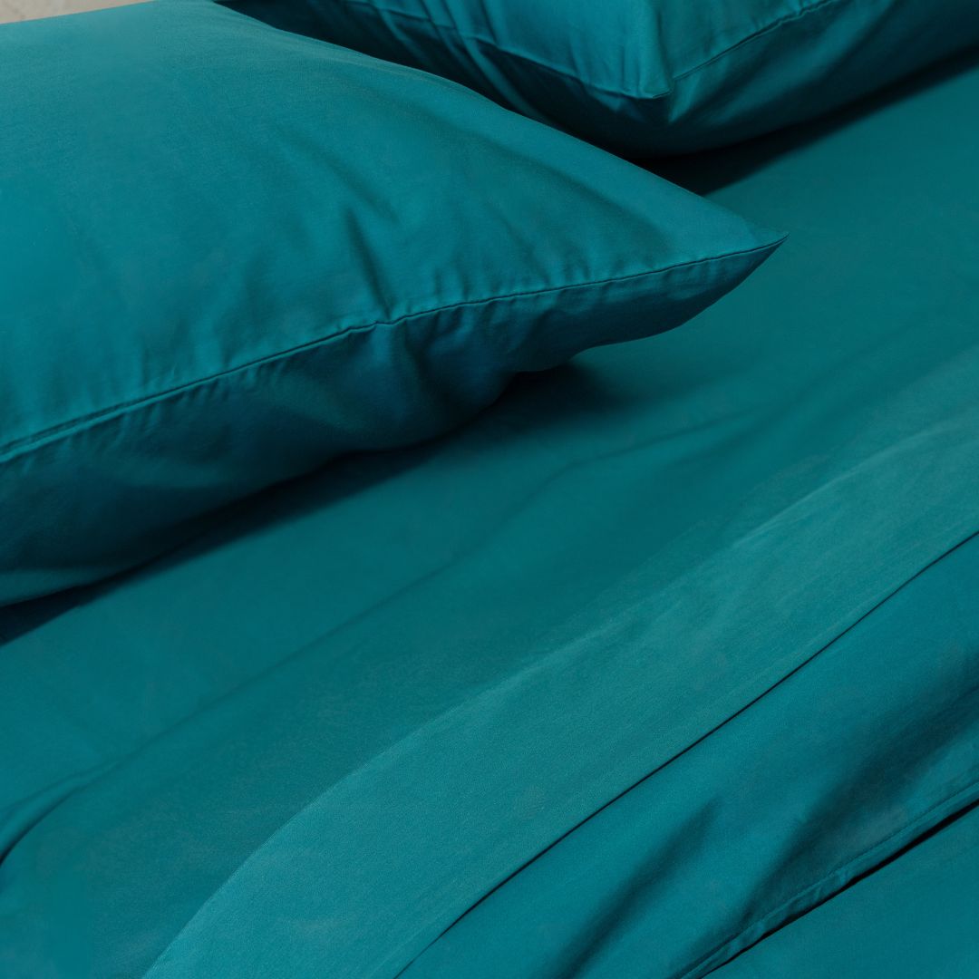 Teal bed Sheets Close Up