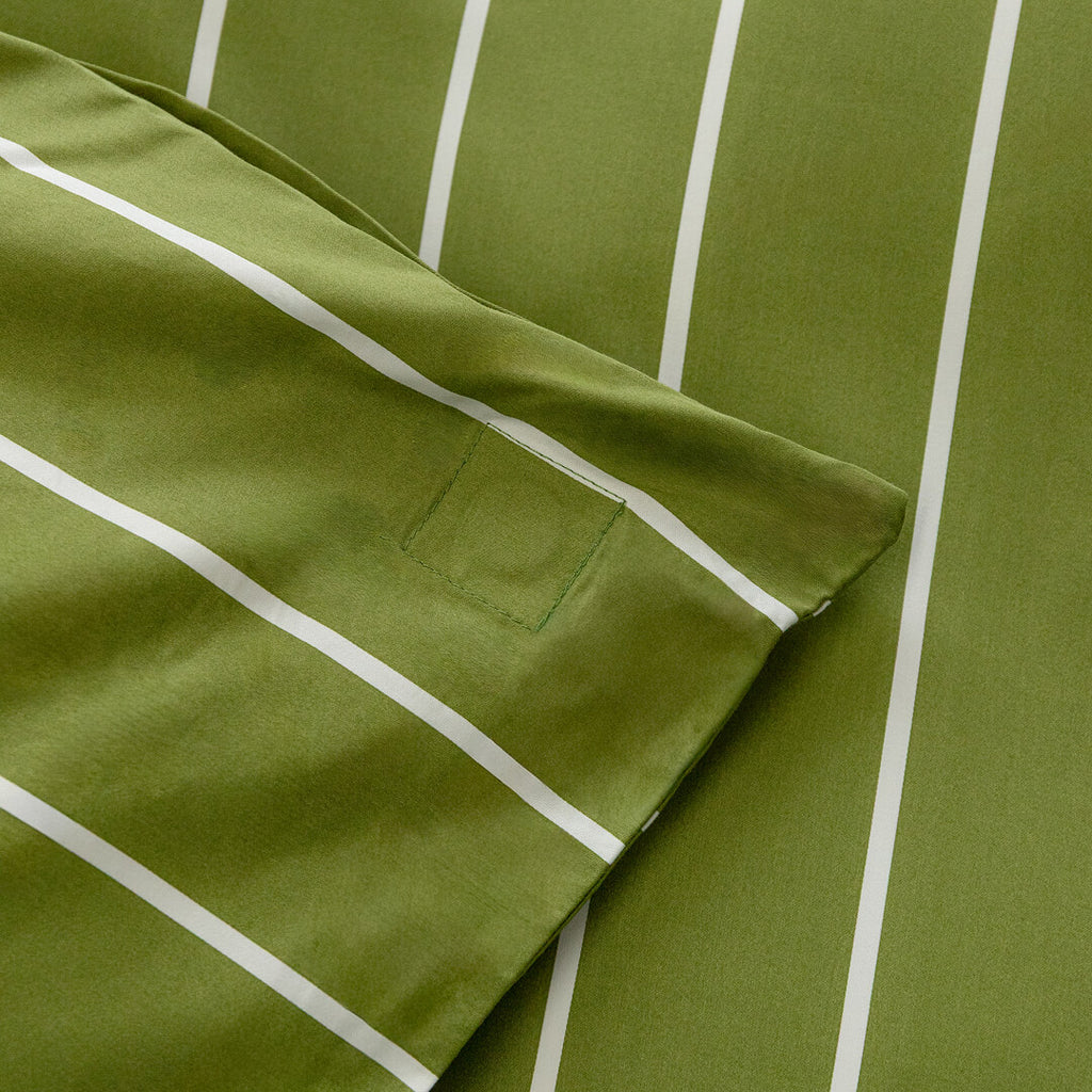 Green fabric with white stripes and a magnetic clip corner.