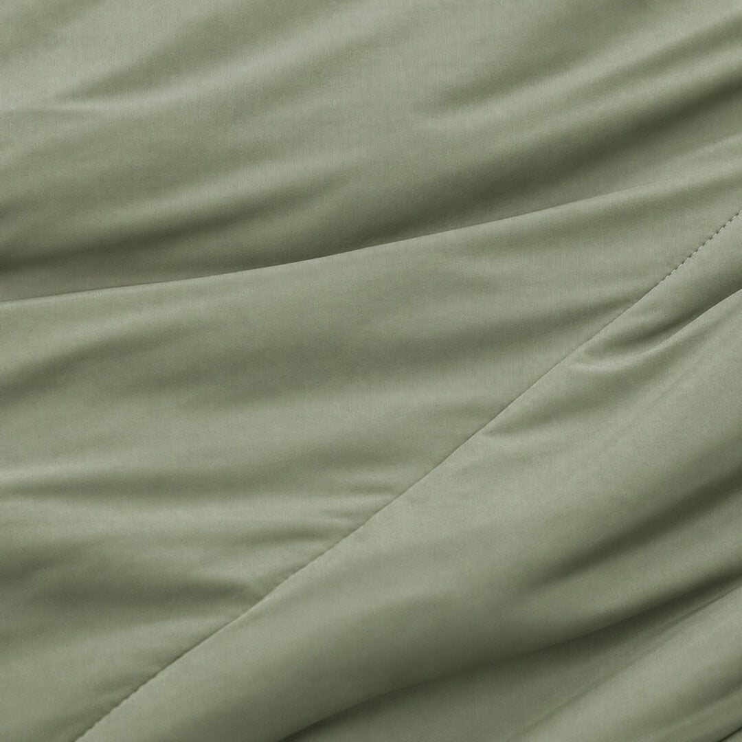 Close-up of green fabric with a slight texture