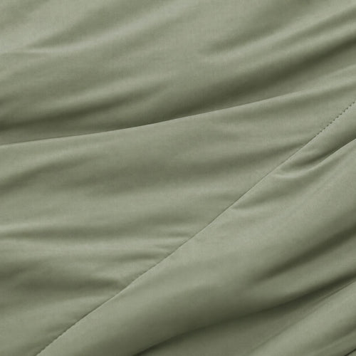 Close-up of green fabric with a slight texture