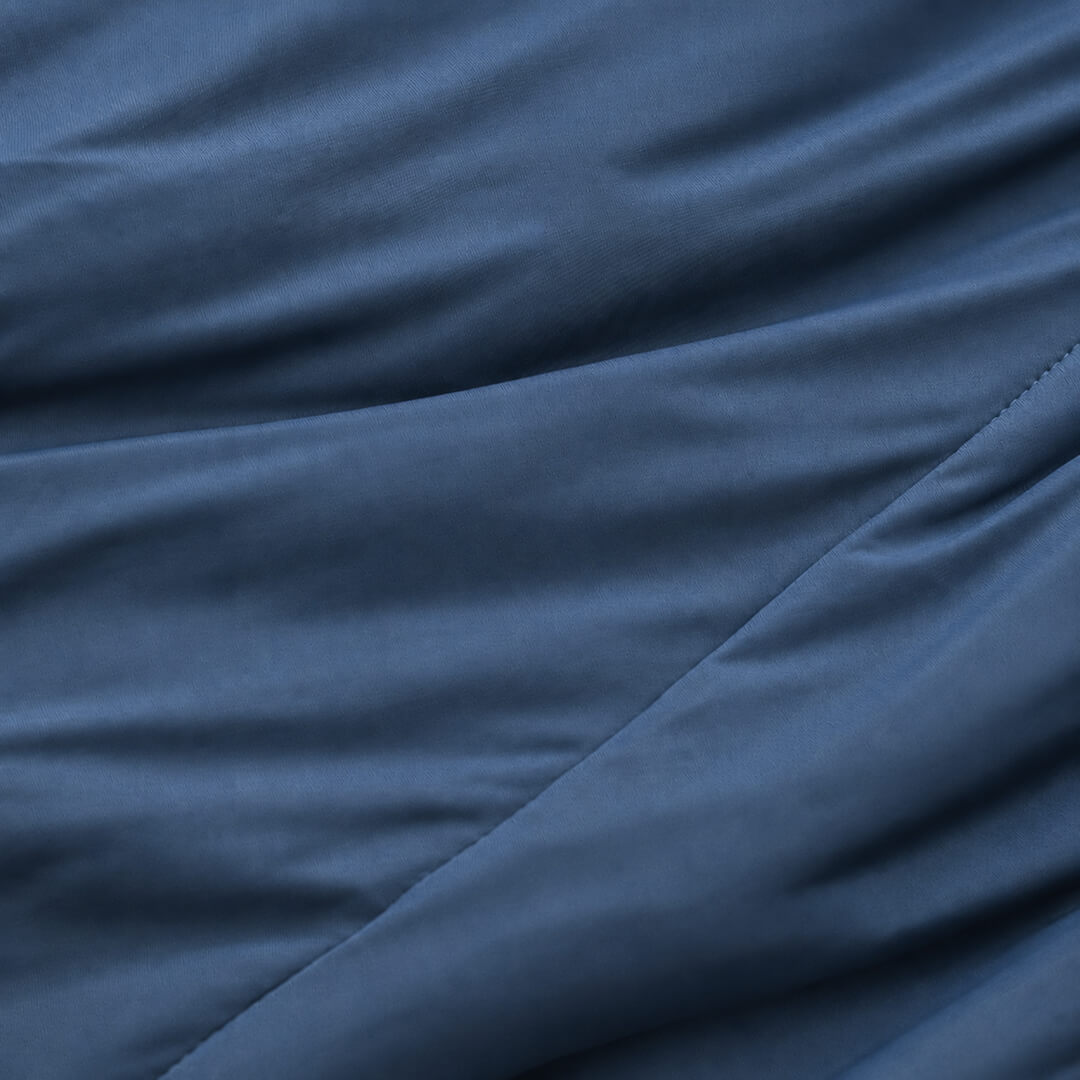 Close-up of blue fabric with visible texture
