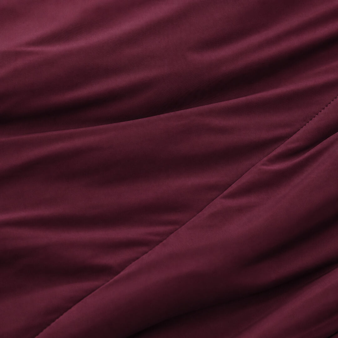 Close-up of burgundy fabric with folds