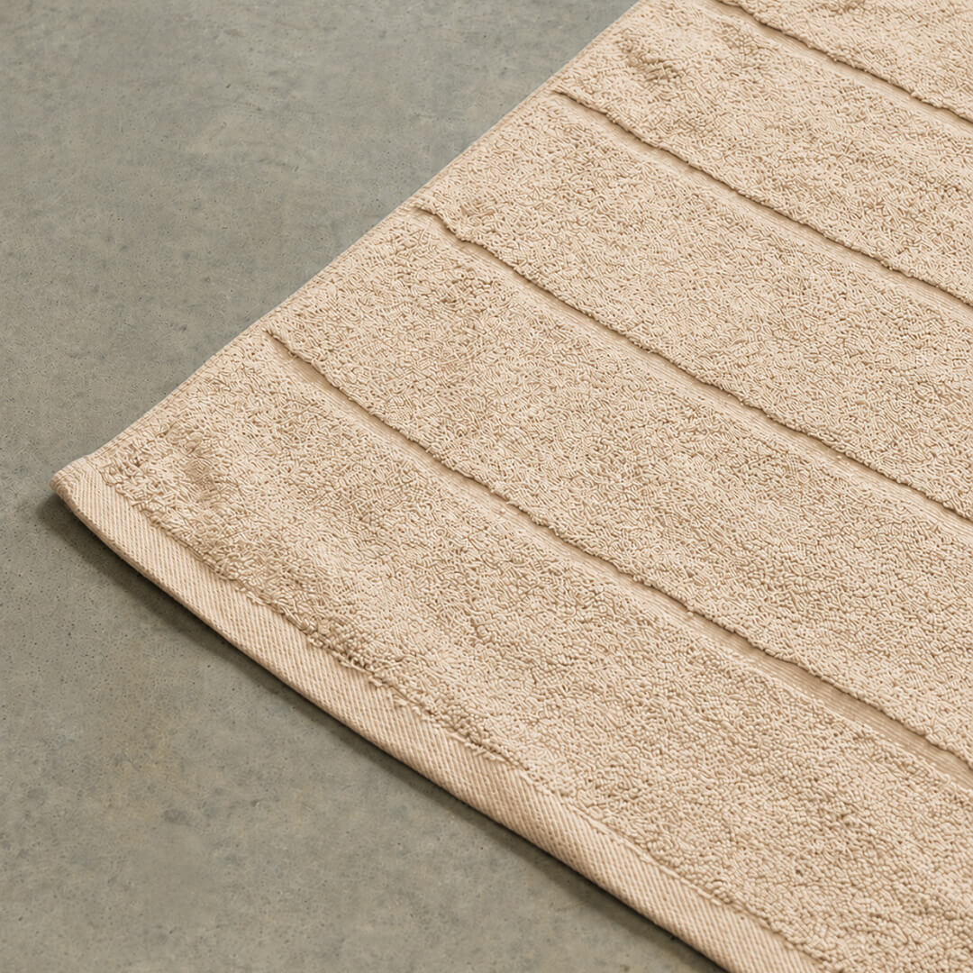 Beige bath towel corner detail