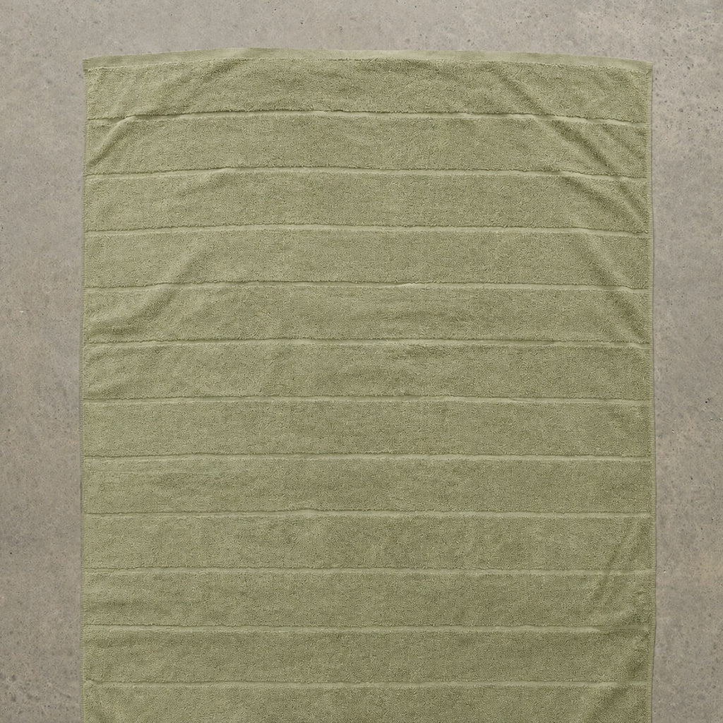 Sage bath towel flat lay 