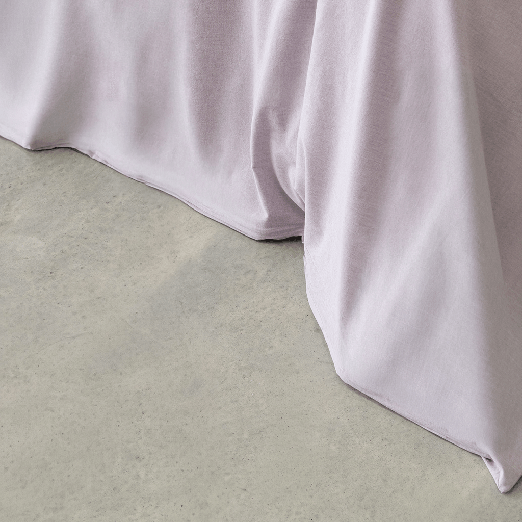 Close-up of the Daylesford quilt cover showcasing the soft fabric drape and neatly finished hem.