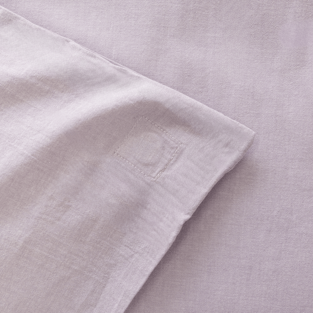 Close-up of the Daylesford quilt cover showing the internal corner tie for securing the quilt insert.