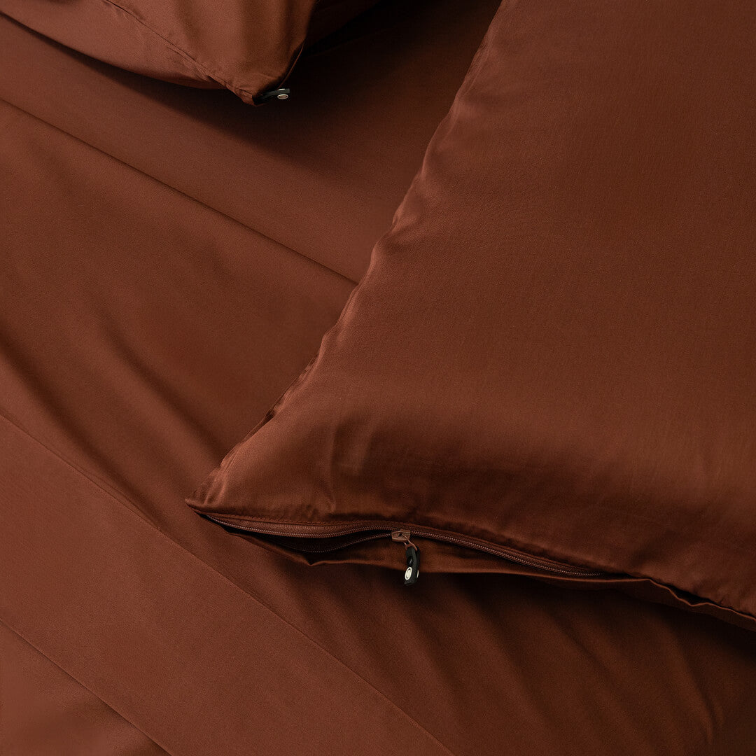 Chocolate brown pillowcases with zips.