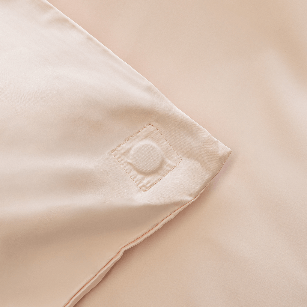 Close-up of the internal quilt attachment point inside the quilt cover, designed to help keep the insert securely in place and reduce shifting.
