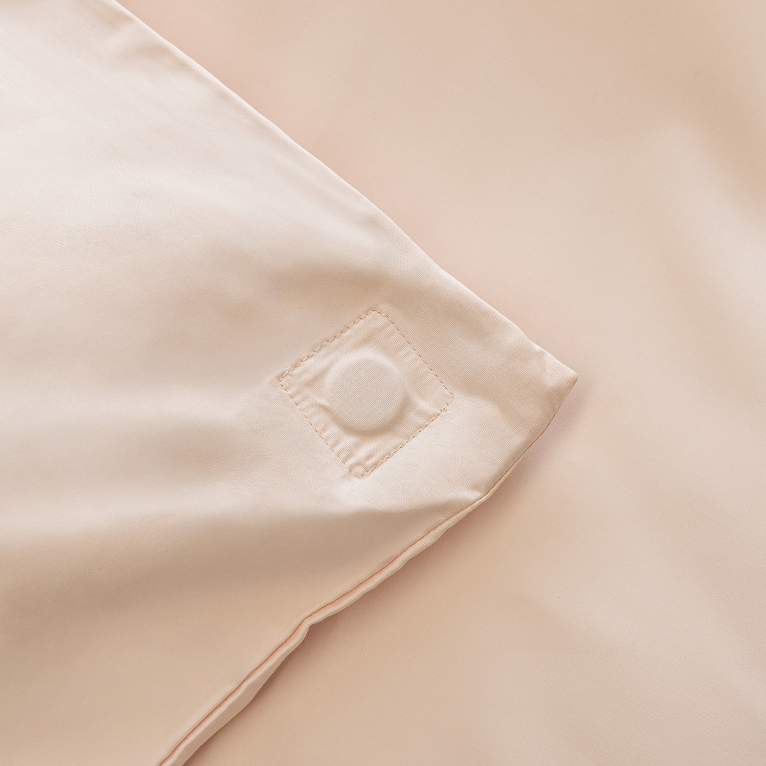 Close-up of the internal quilt attachment point inside the quilt cover, designed to help keep the insert securely in place and reduce shifting.