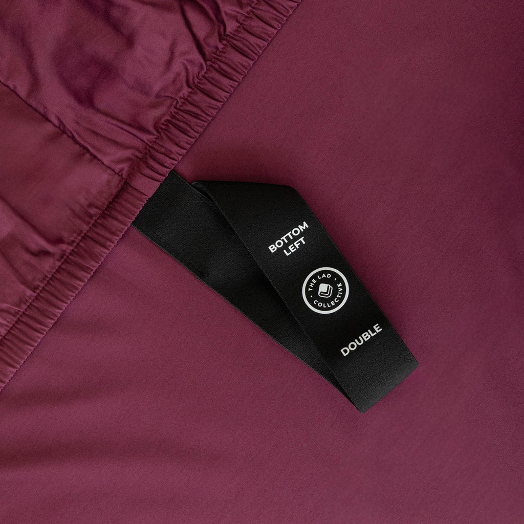 Close up of corner strap in deep maroon