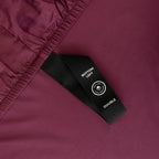 Close up of corner strap in Maroon Bedding.