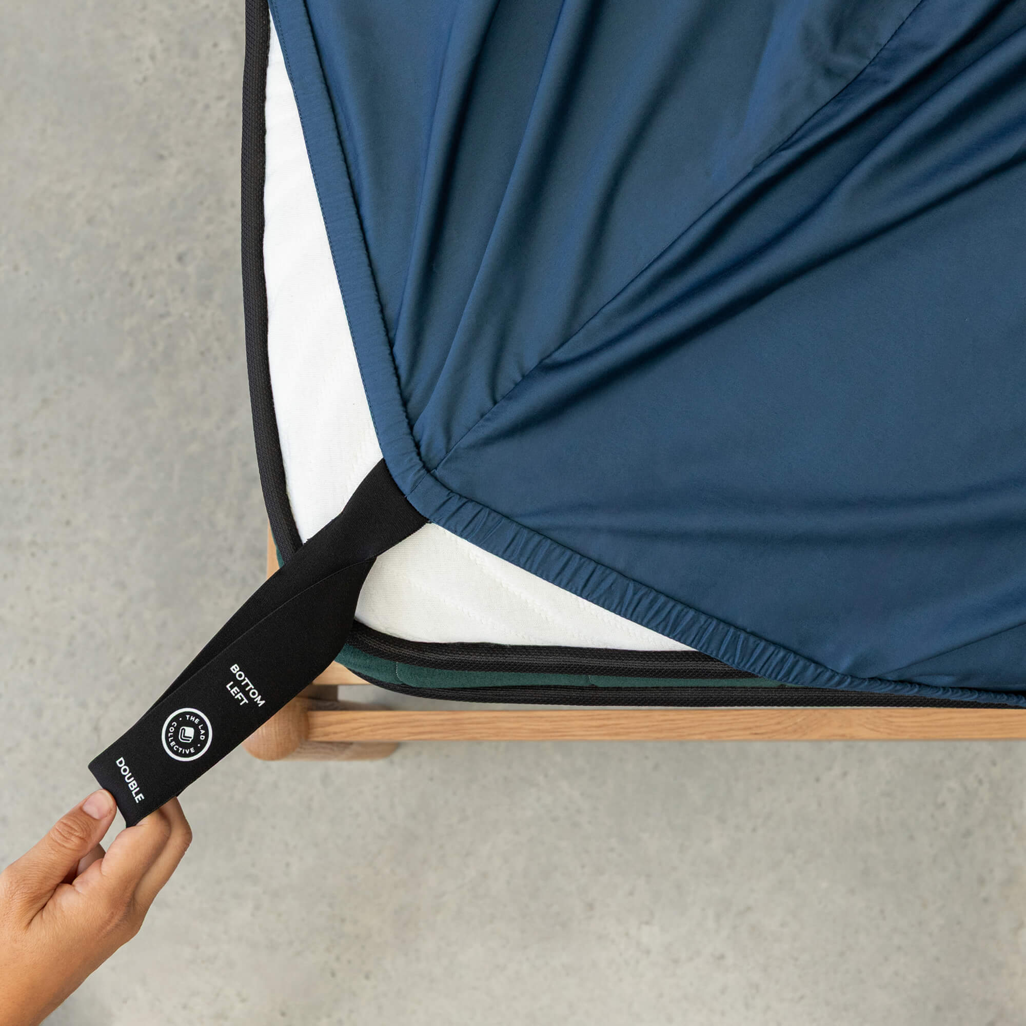 Close up or corner strap being pulled in Pacific Blue