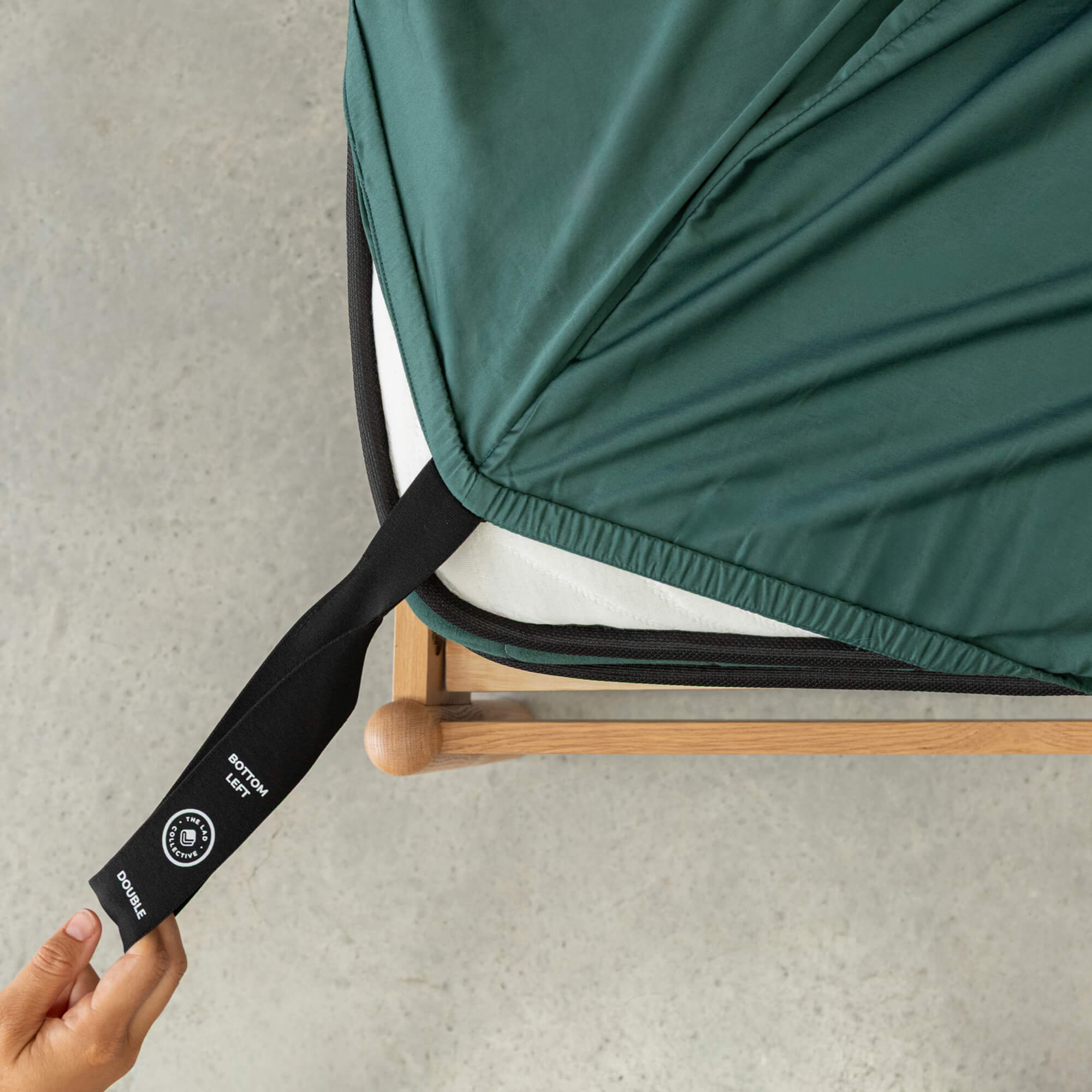 Close up or corner strap being pulled in Port Douglas Green