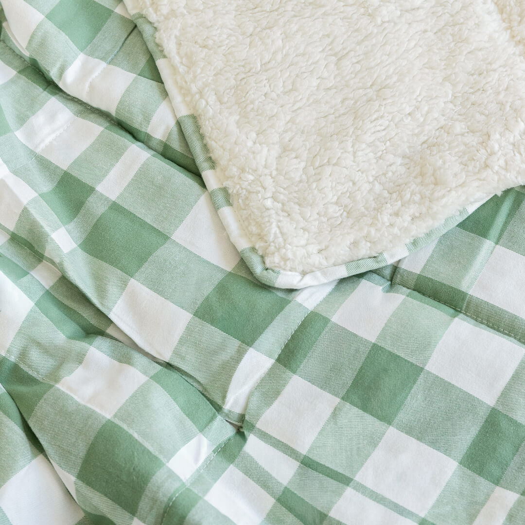 Green and white checkered fabric with a soft texture.