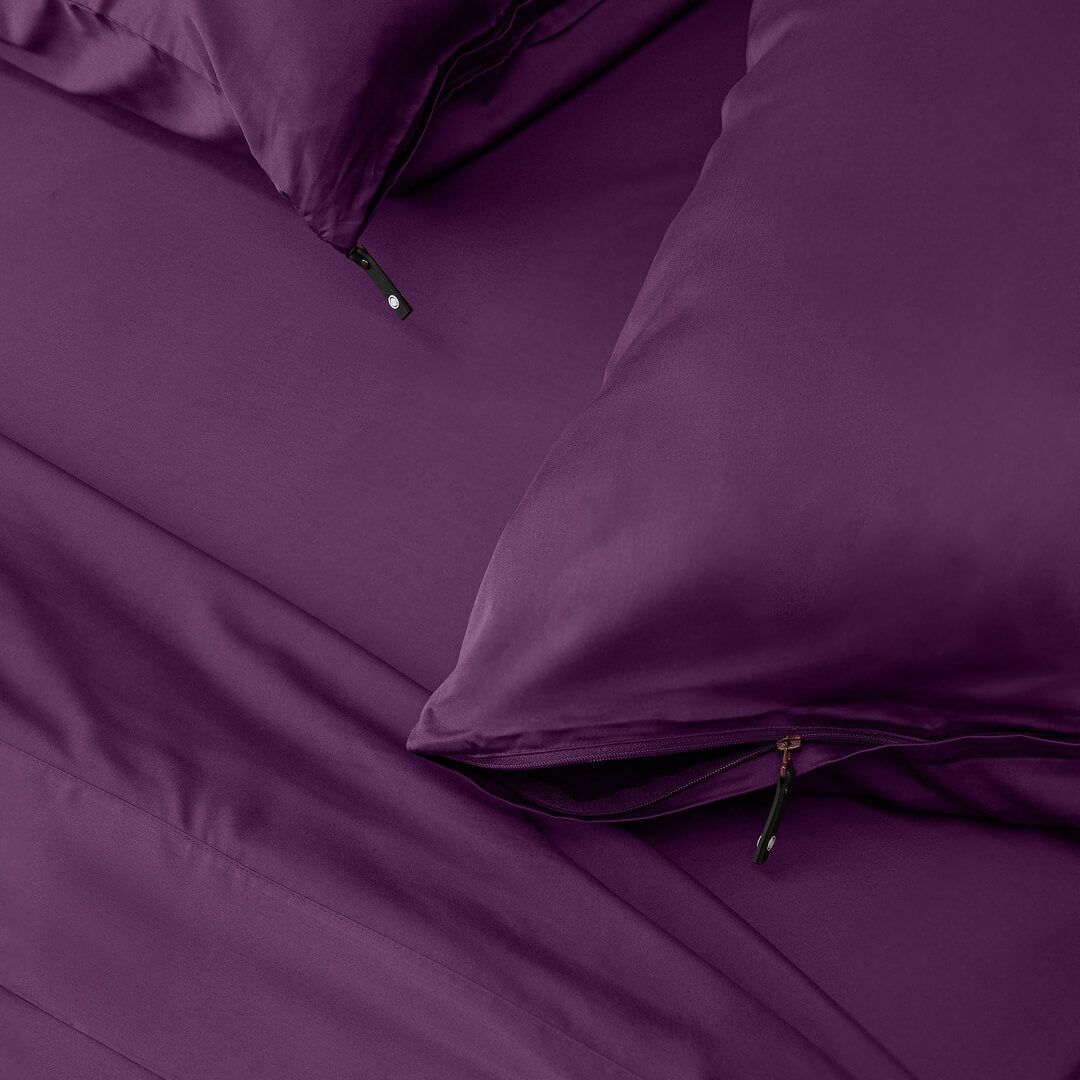 Deep purple invisible zip pillowcases close up.