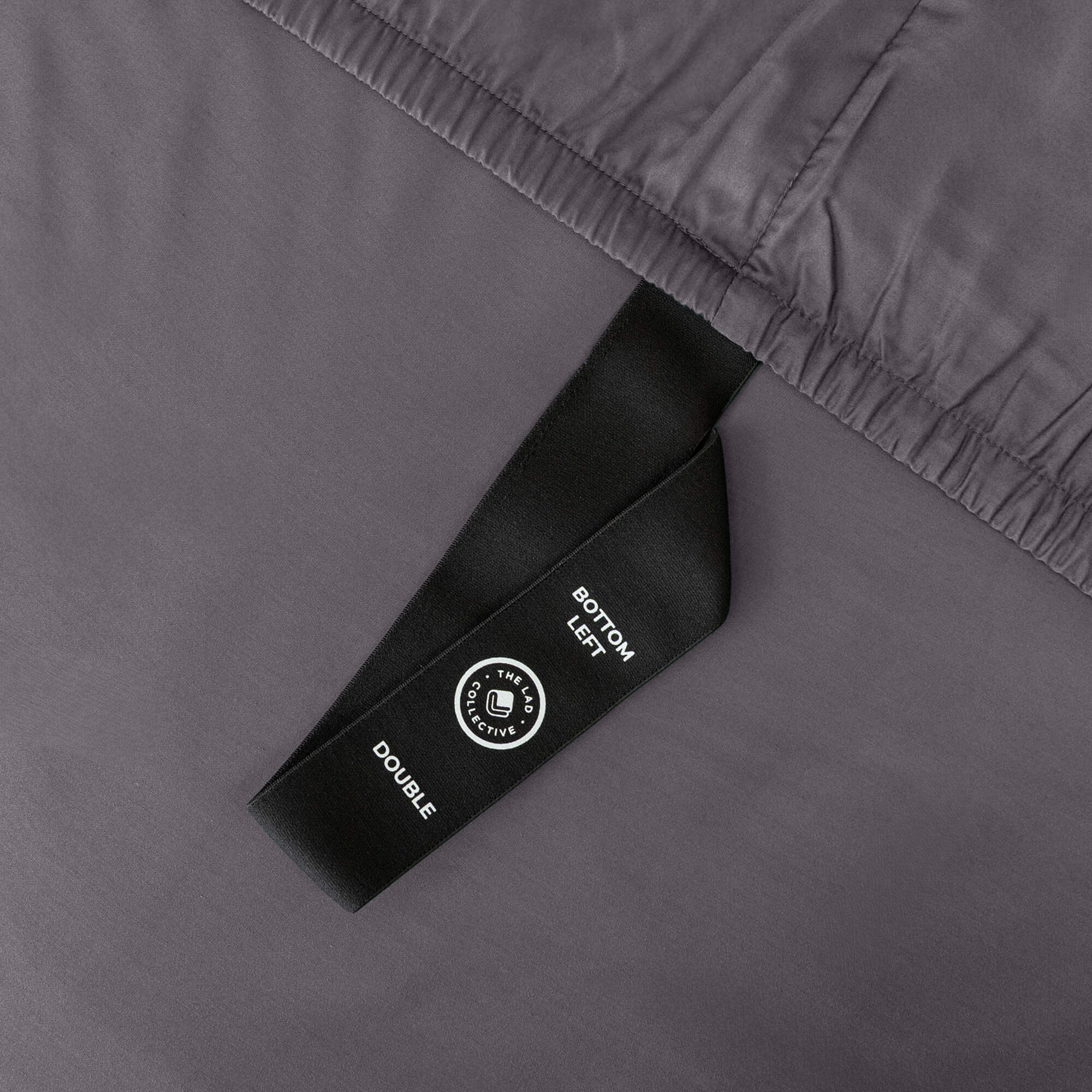 Close up of corner strap in Charcoal Tasman