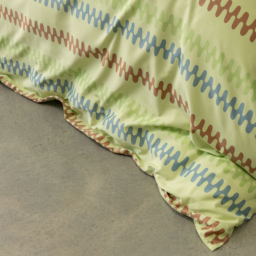 Textured fabric with wavy pattern on a neutral background