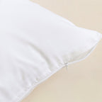 White pillowcase zipper closeup.