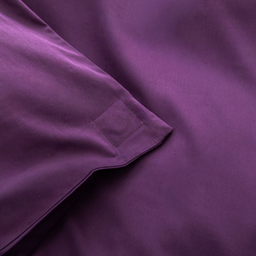 Close-up of purple fabric with a magnetic corner magnet