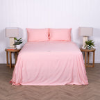Front-facing view of bed made with pink Streak Bay bedding set.