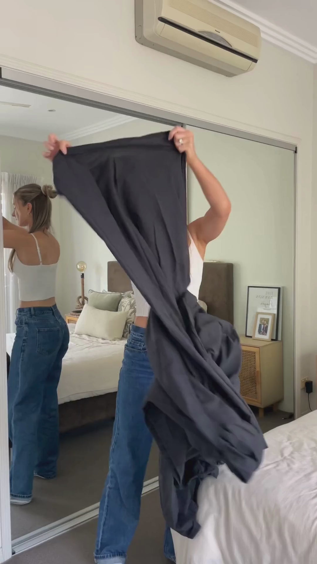 Girl making the bed 